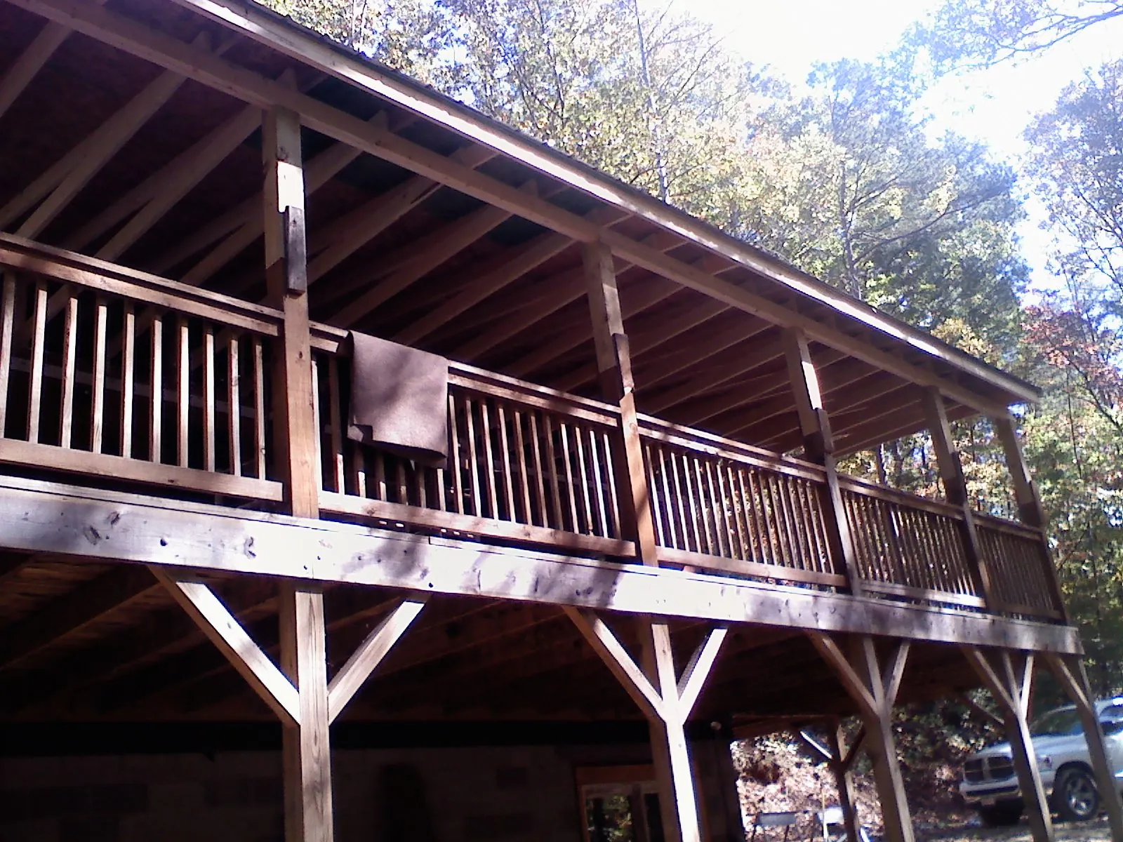 Timber framing under a new elevated porch and deck — Roof Leak Repair in Register by Roofing Brothers
